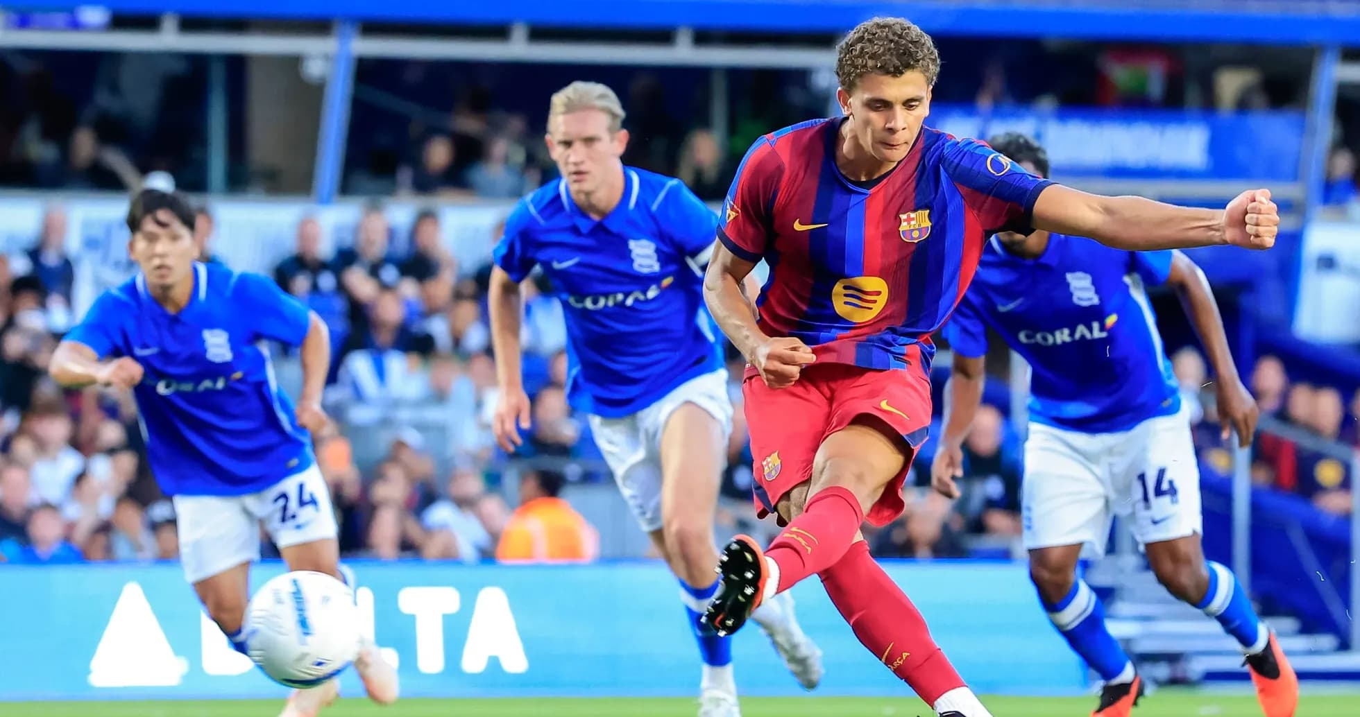 Barcelona player taking a penalty kick against Birmingham