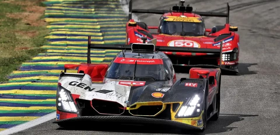 Racing cars competing on track during event