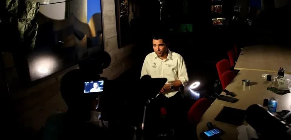 Interviewer speaking during a video interview setup