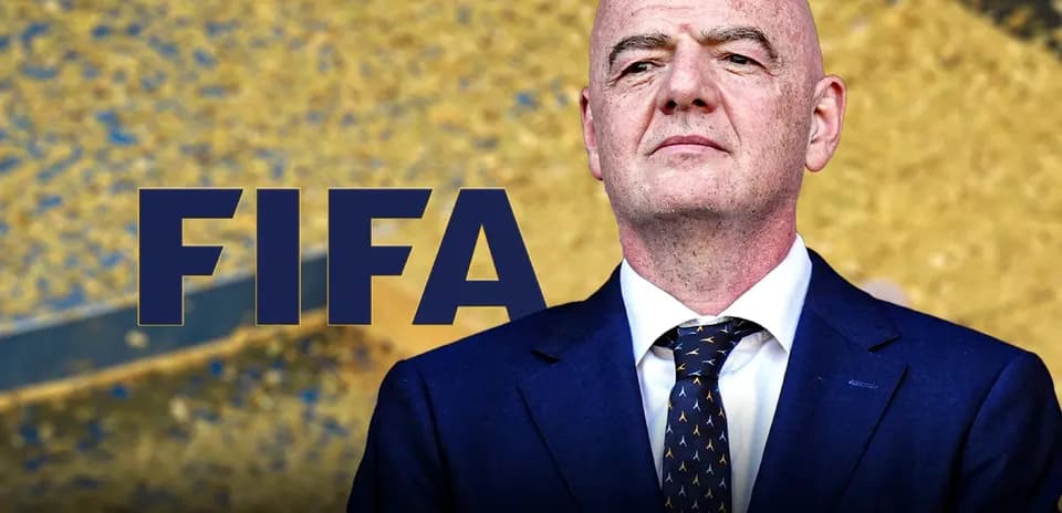 FIFA logo with official at event backdrop