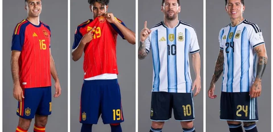 Football players in national team jerseys posing together