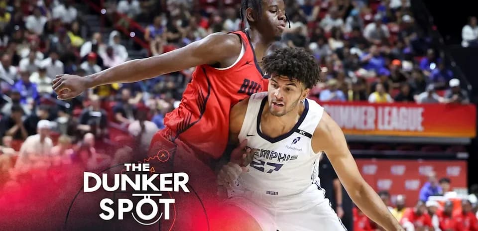 Two basketball players competing during summer league game