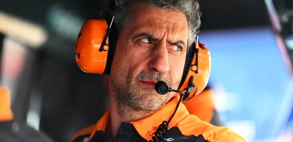 Team member wearing headset in pit area