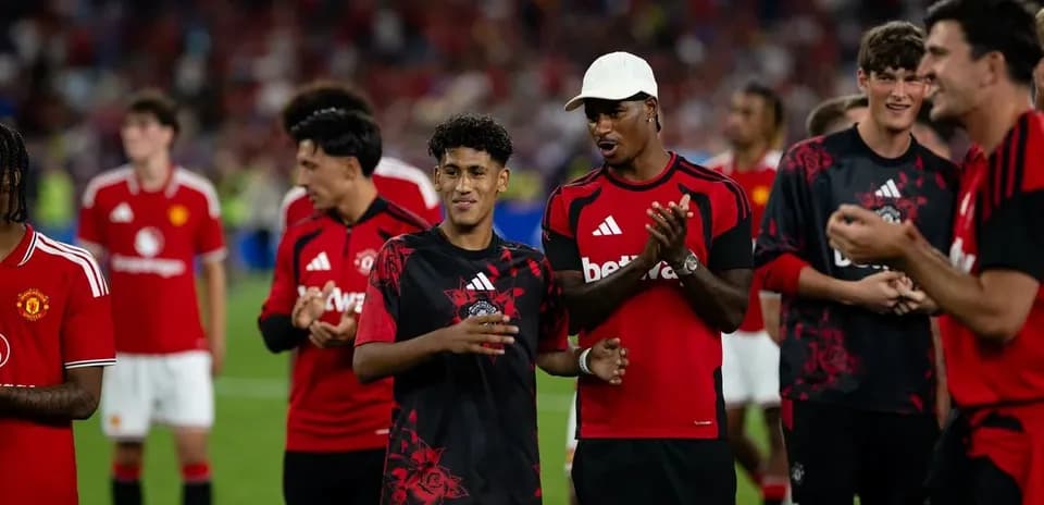Manchester United players celebrating after match