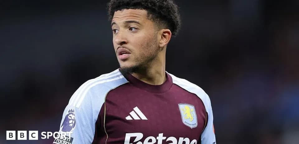 Aston Villa player during match, focused on game