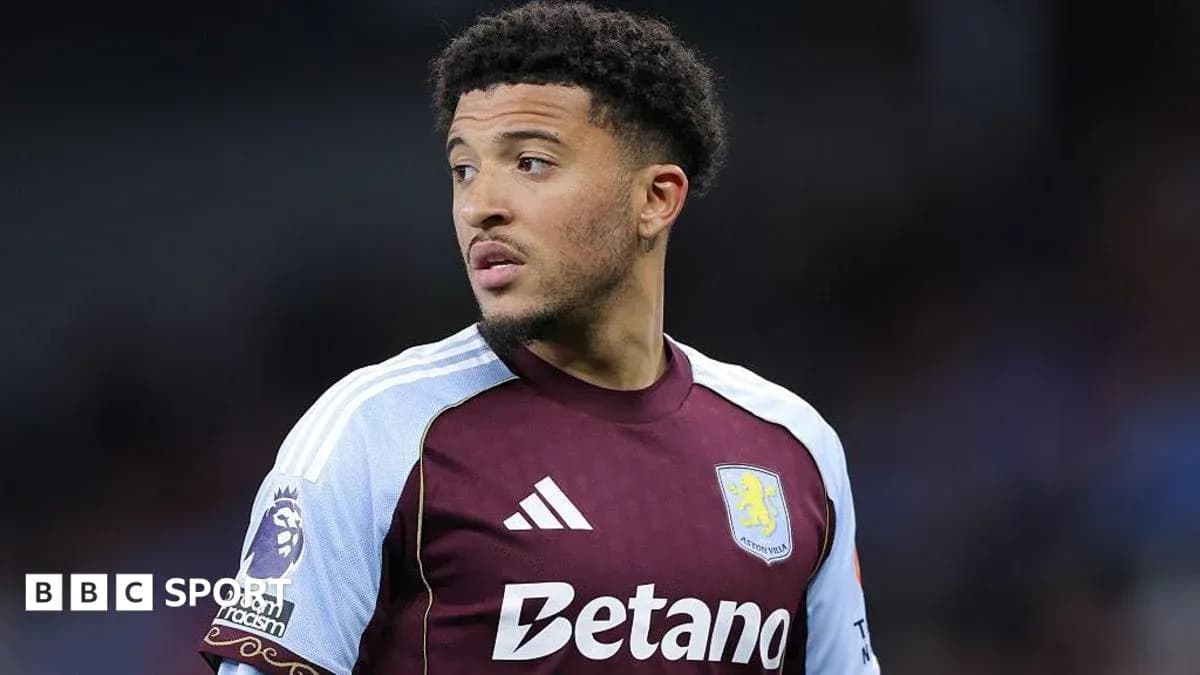 Aston Villa player during match, focused on game
