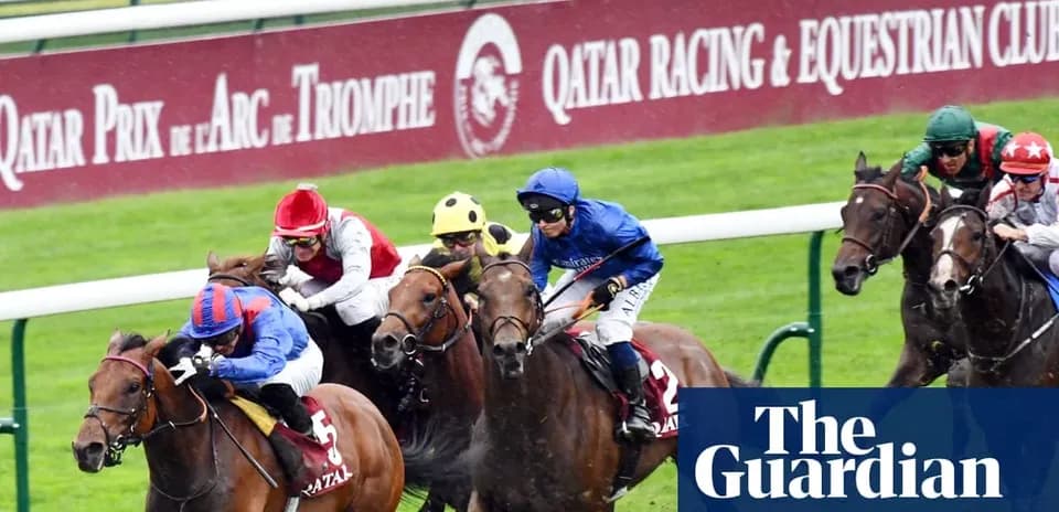 Jockeys racing horses at Qatar Prix de l'Arc de Triomphe