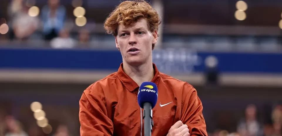 Tennis player speaking at press conference microphone