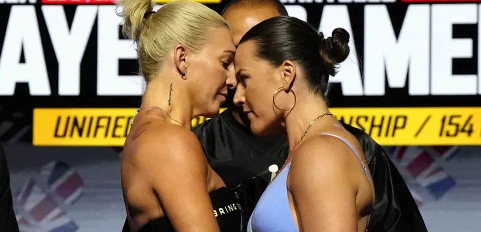 Boxers face-off during championship weigh-in event
