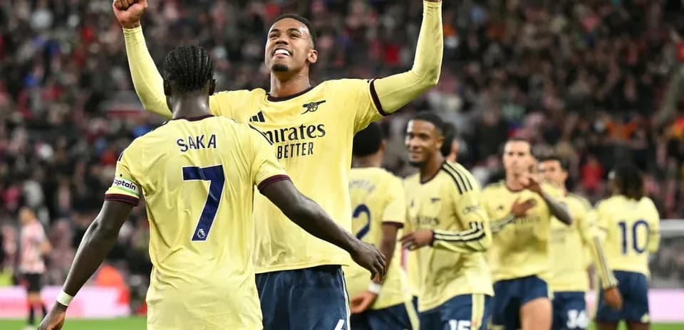 Arsenal players celebrating a goal during match