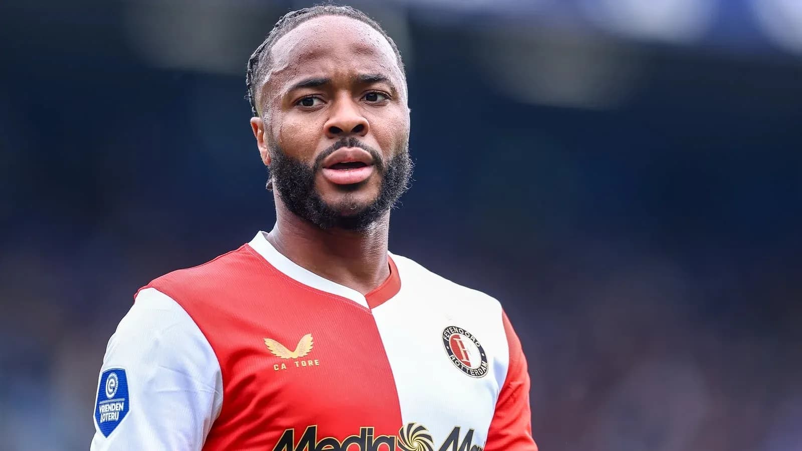 Feyenoord player in home kit during match