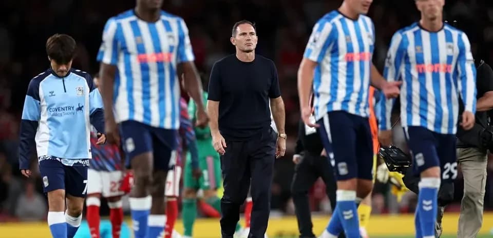 Coventry City players walking off the pitch after match