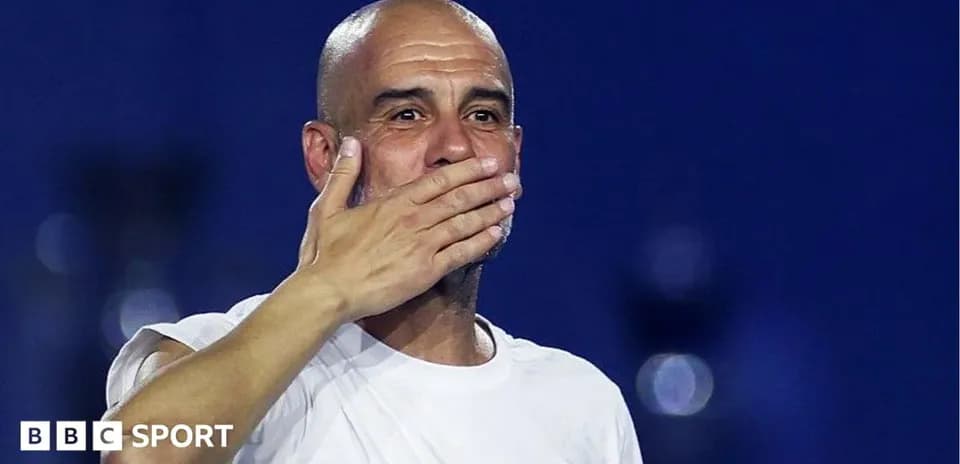 Bald coach gesturing with hand after match