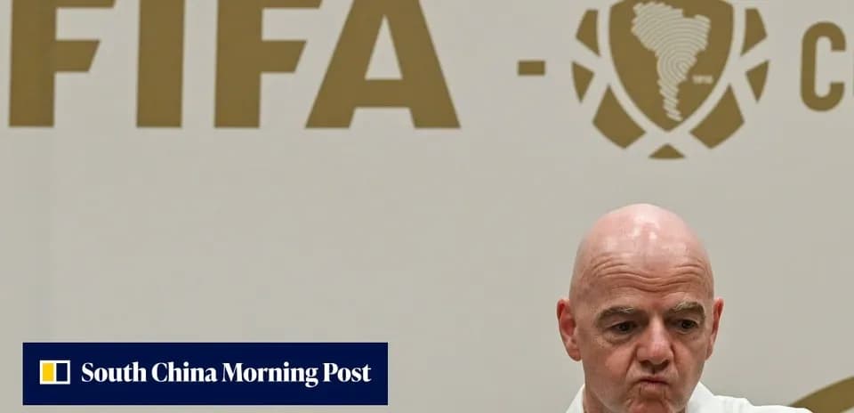 FIFA president at press conference backdrop