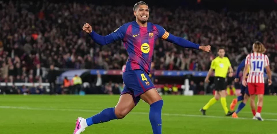 Barcelona player celebrating a goal in stadium