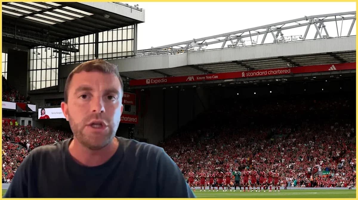Analyst speaking in front of football stadium crowd