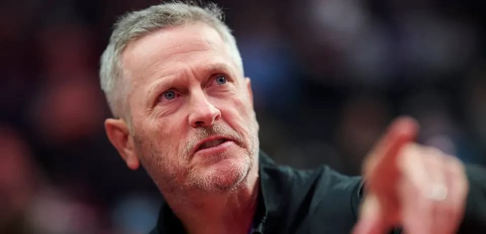 Coach gesturing during a basketball game