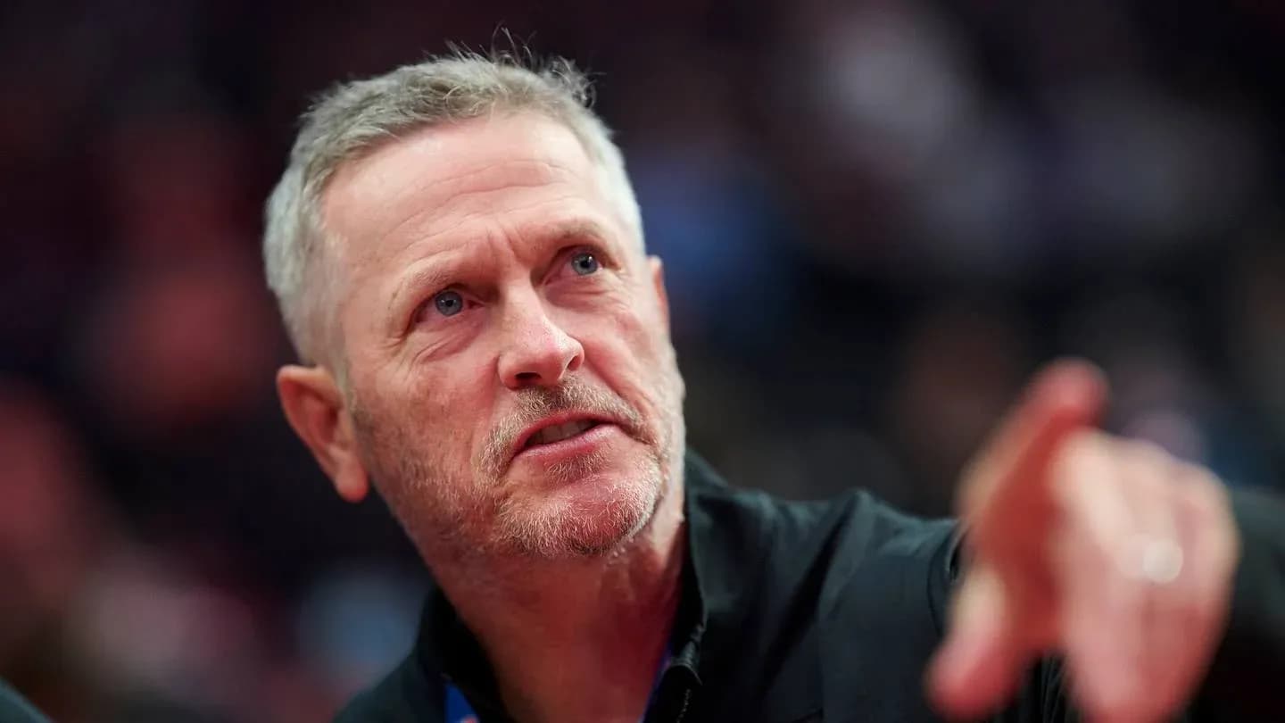 Coach gesturing during a basketball game