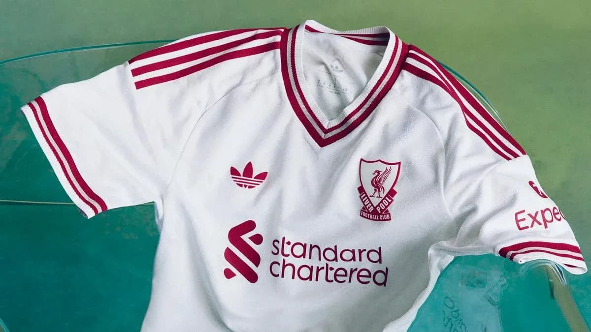 Liverpool FC white jersey with red details displayed