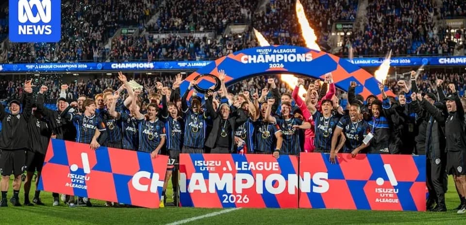 Football team celebrating A-League championship victory
