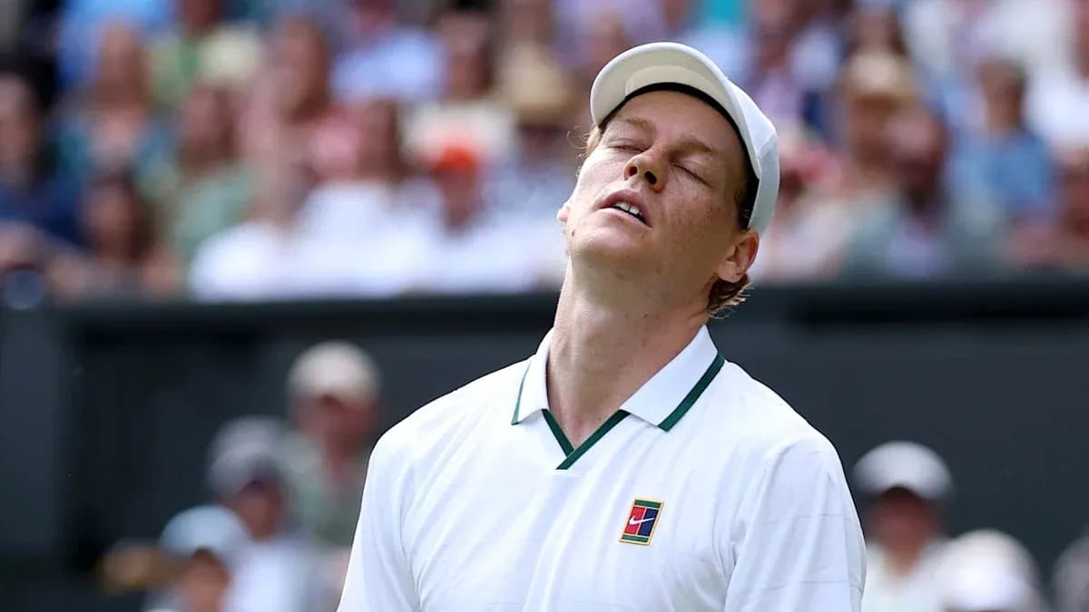 Tennis player reacting during a match at Wimbledon