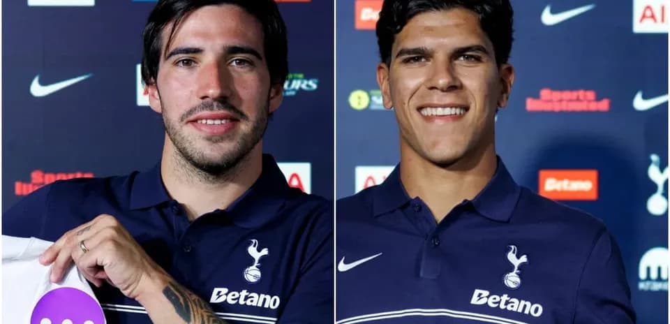 Two players presenting Tottenham Hotspur jerseys at event