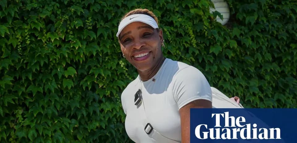 Tennis player smiling against green background