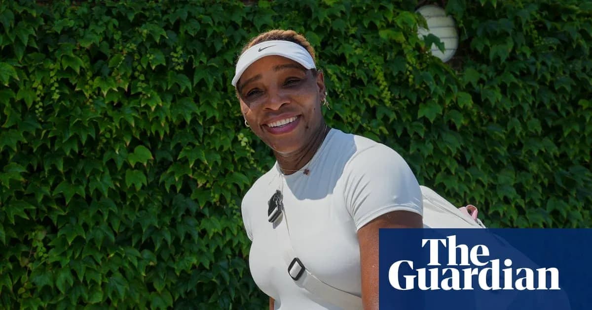 Tennis player smiling against green background