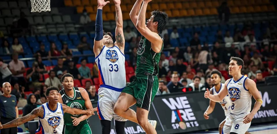 Player shooting a basketball during a game