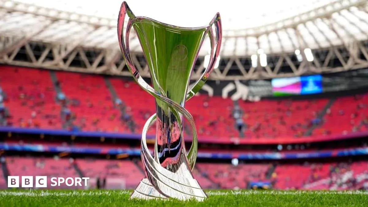 Trophy displayed on the pitch before the match