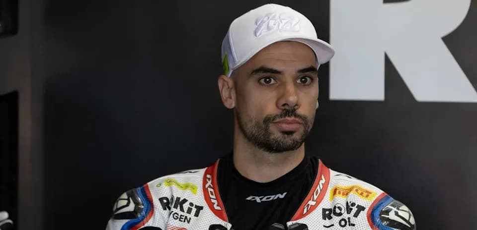 Motorsport athlete in racing gear at event