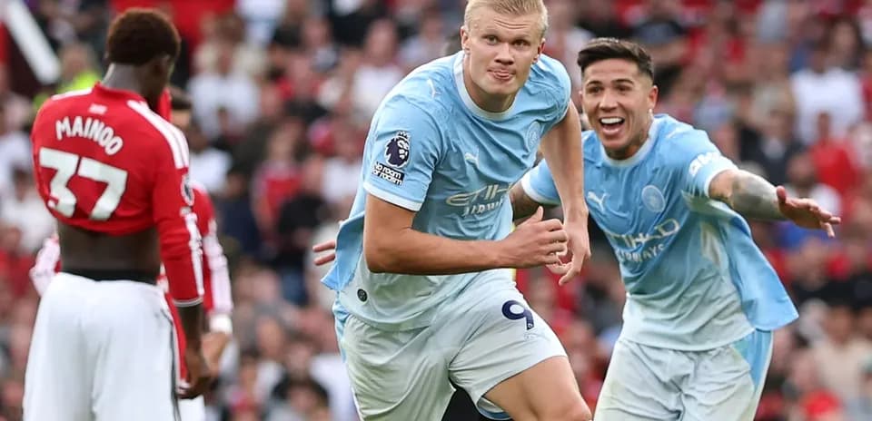Erling Haaland celebrating goal with teammates