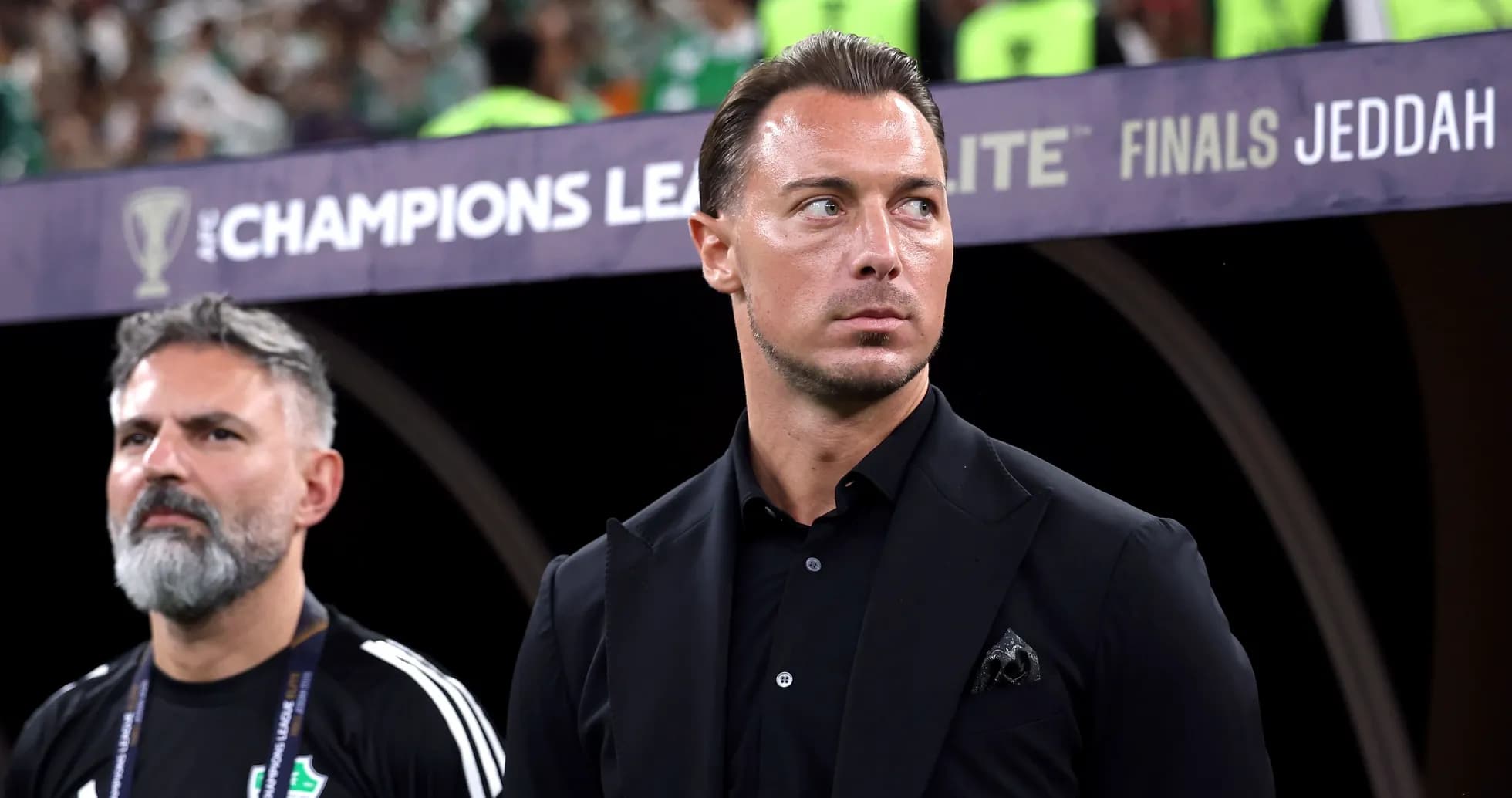 Coaches observing match during AFC Champions League finals