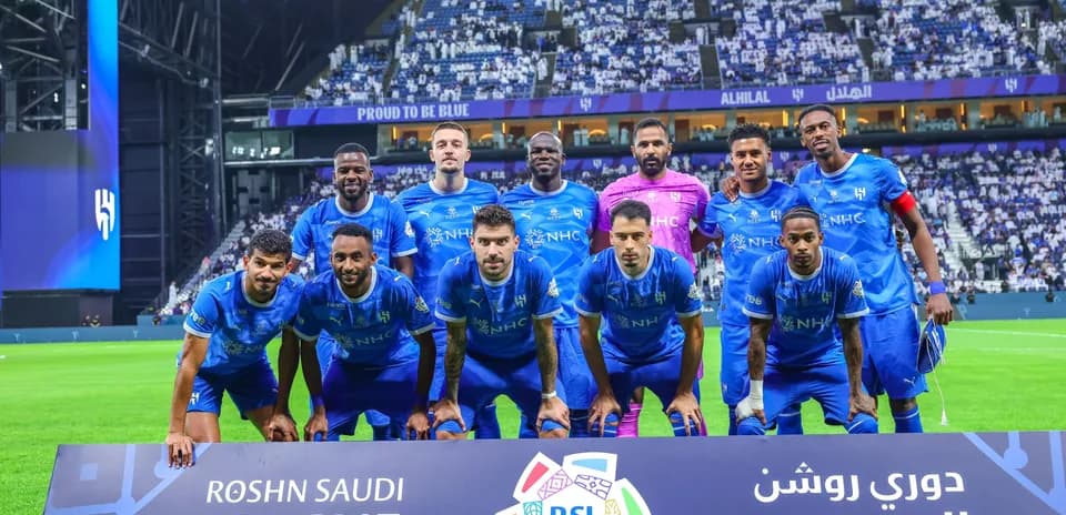Al Hilal team posing before a match at stadium