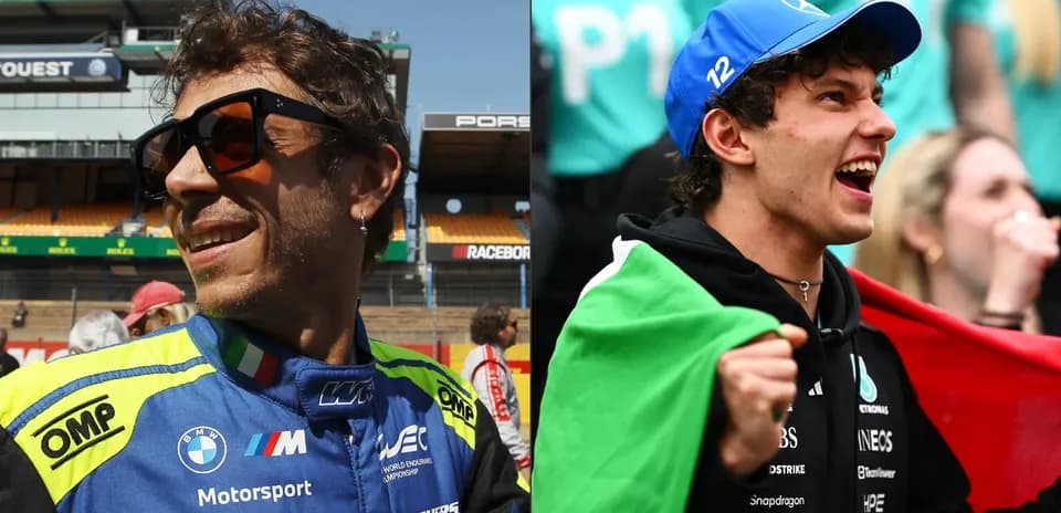 Two motorsport fans celebrating at a race event