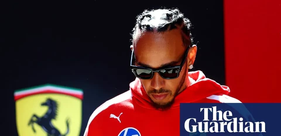 Formula 1 driver in red attire before event