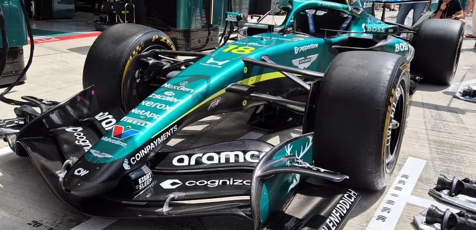 Formula 1 car in the pit lane during event