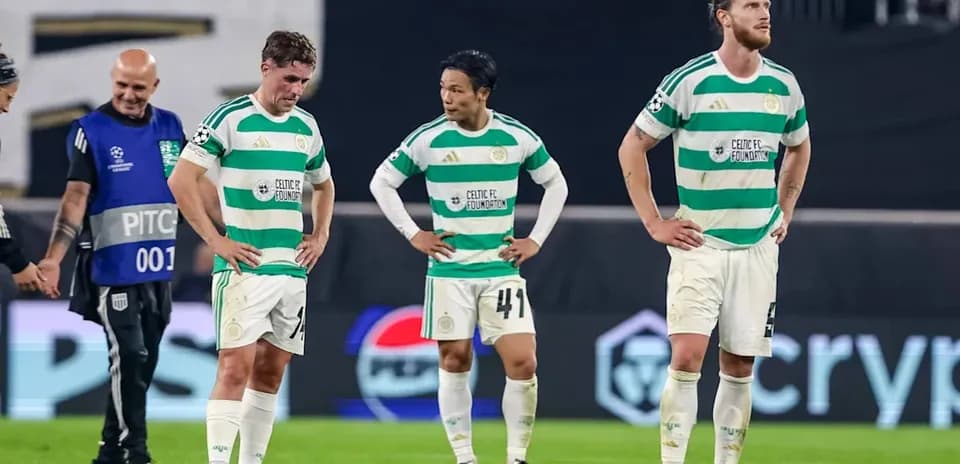 Celtic FC players standing dejected after match