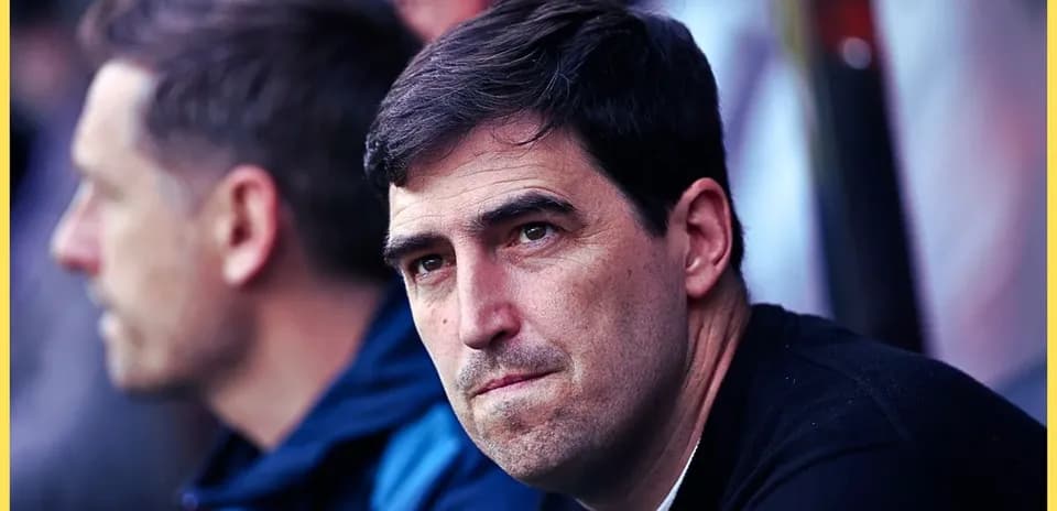 Football manager observing from the sidelines