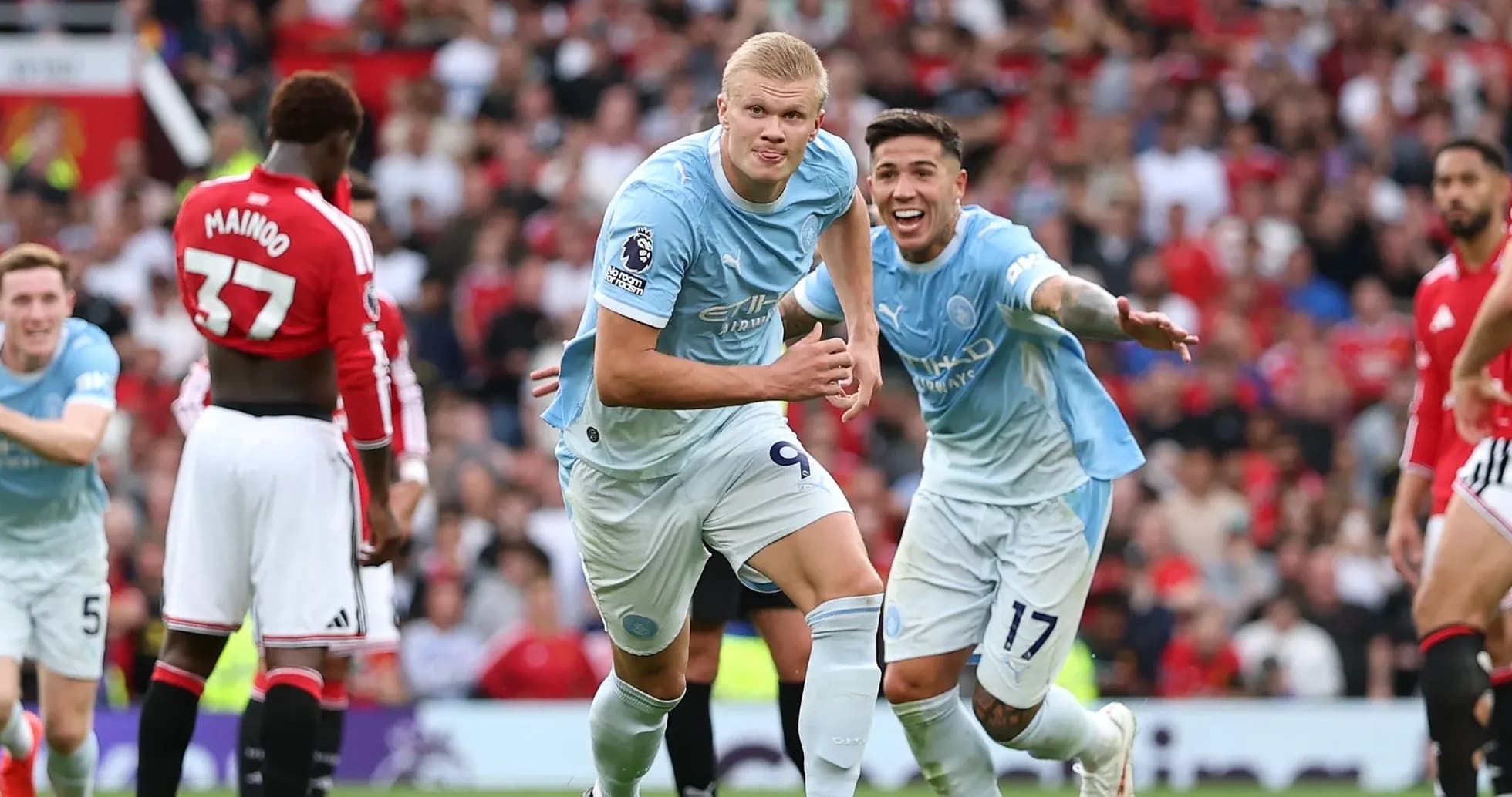 Erling Haaland celebrating a goal with teammates