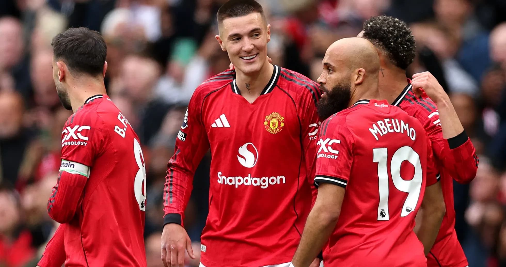 Manchester United players celebrating during a match