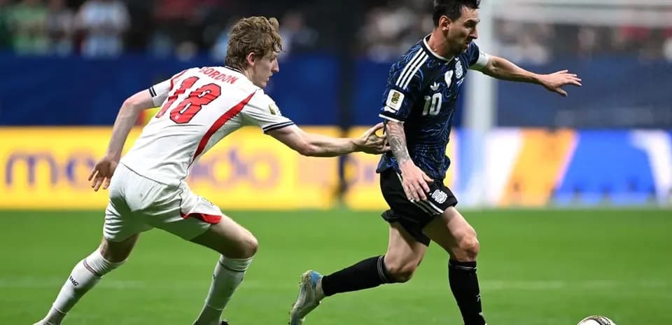 Lionel Messi evading defender during soccer match