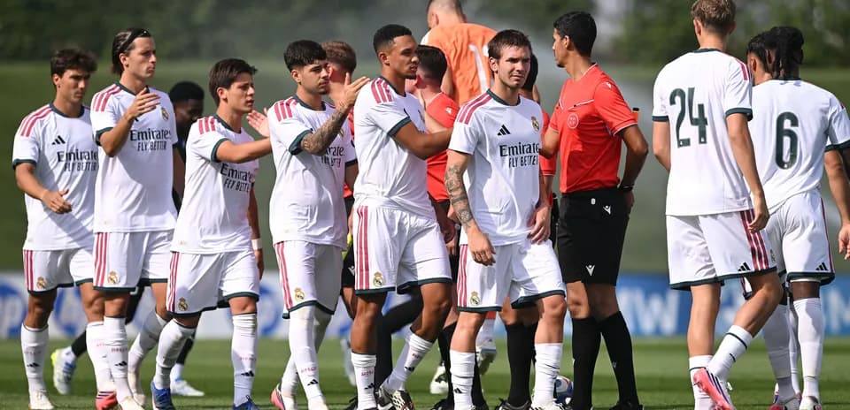 Real Madrid players greeting referee before match