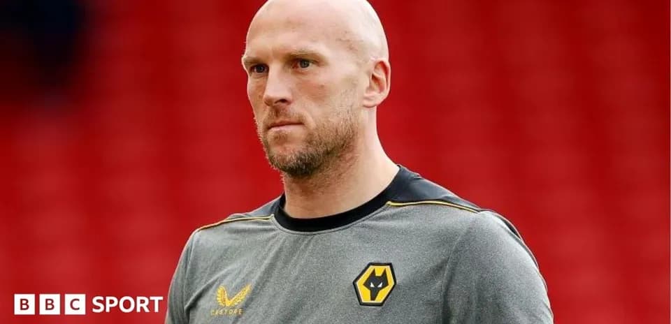 Goalkeeper wearing training kit before match