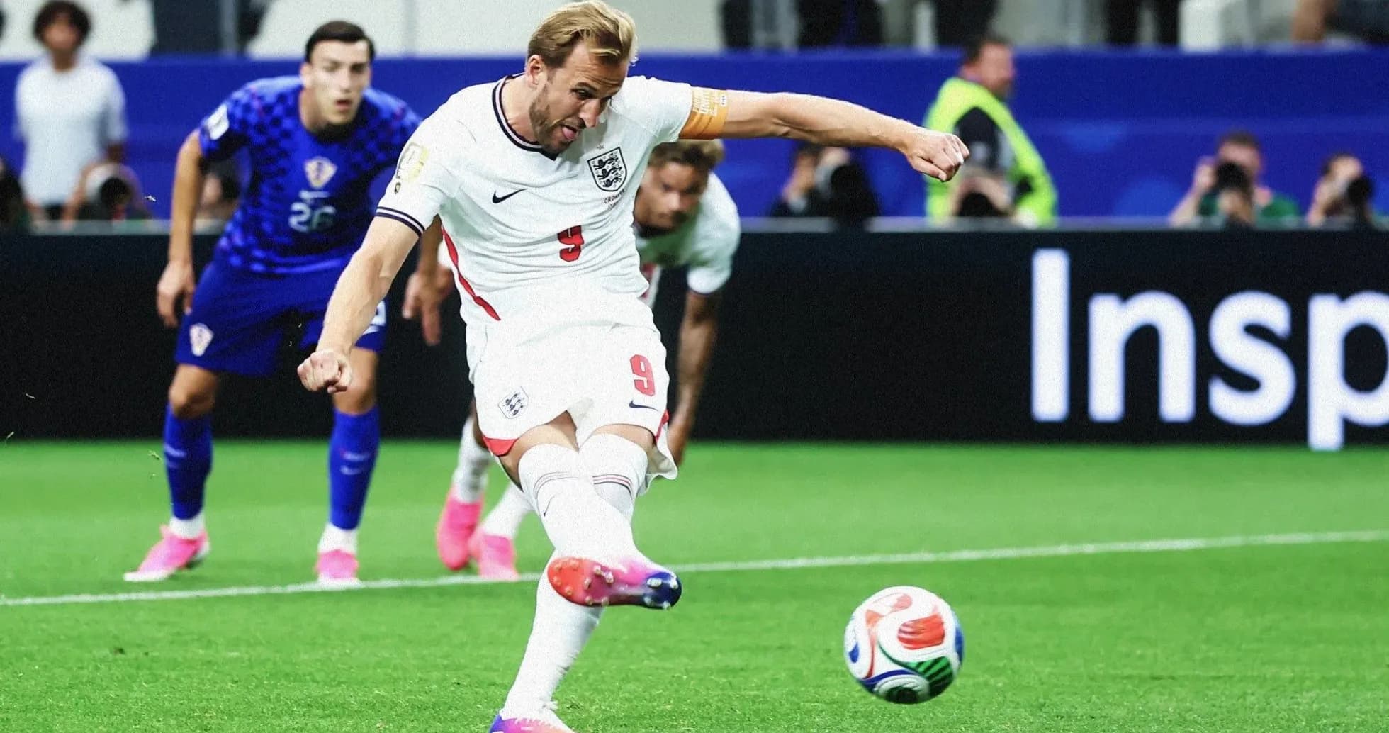Harry Kane taking a penalty kick during match