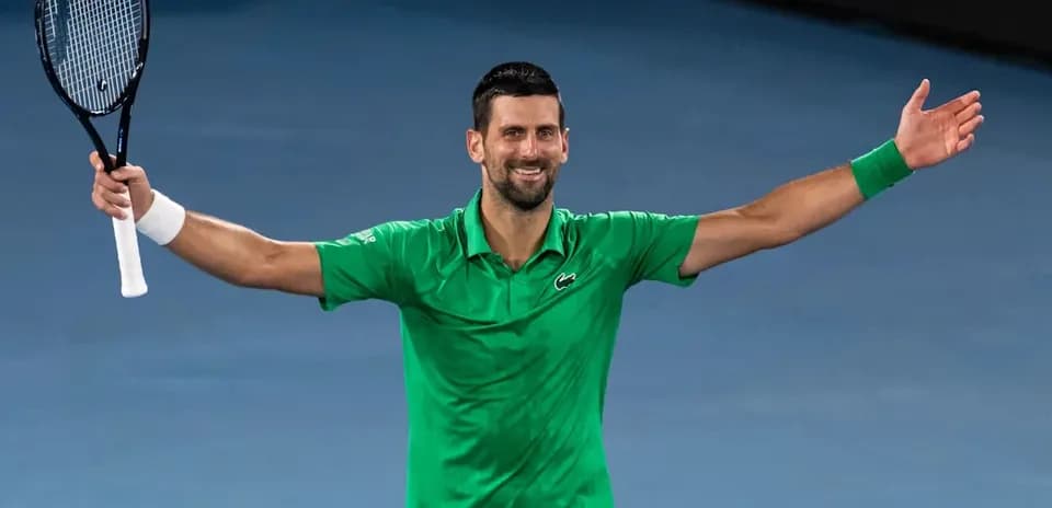 Tennis player celebrating after winning a match