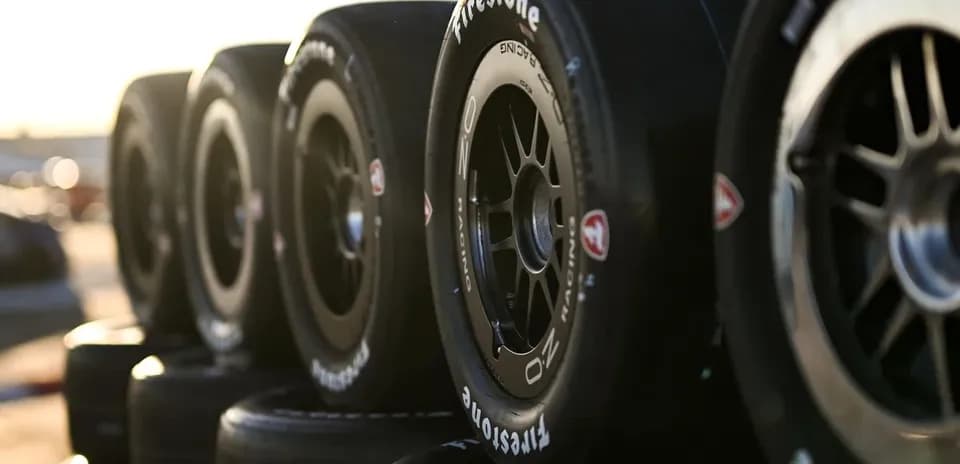 Firestone racing tires stacked for use