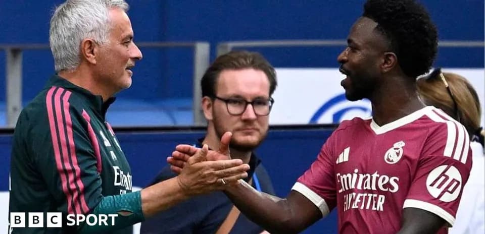 Mourinho and player shaking hands on pitch