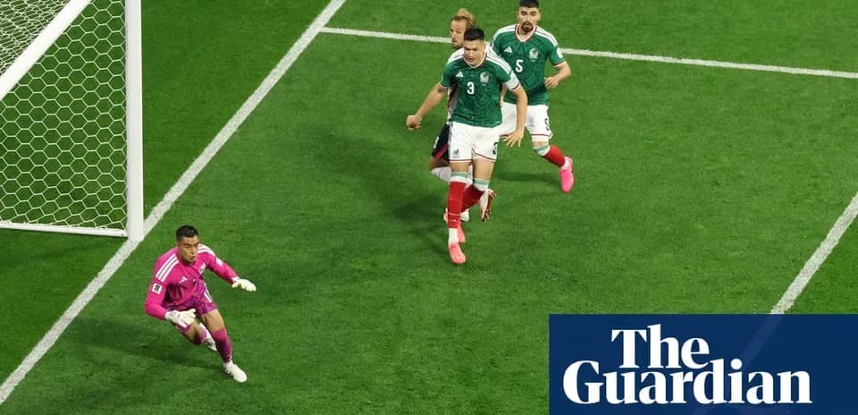 Mexican players defending near goal during match