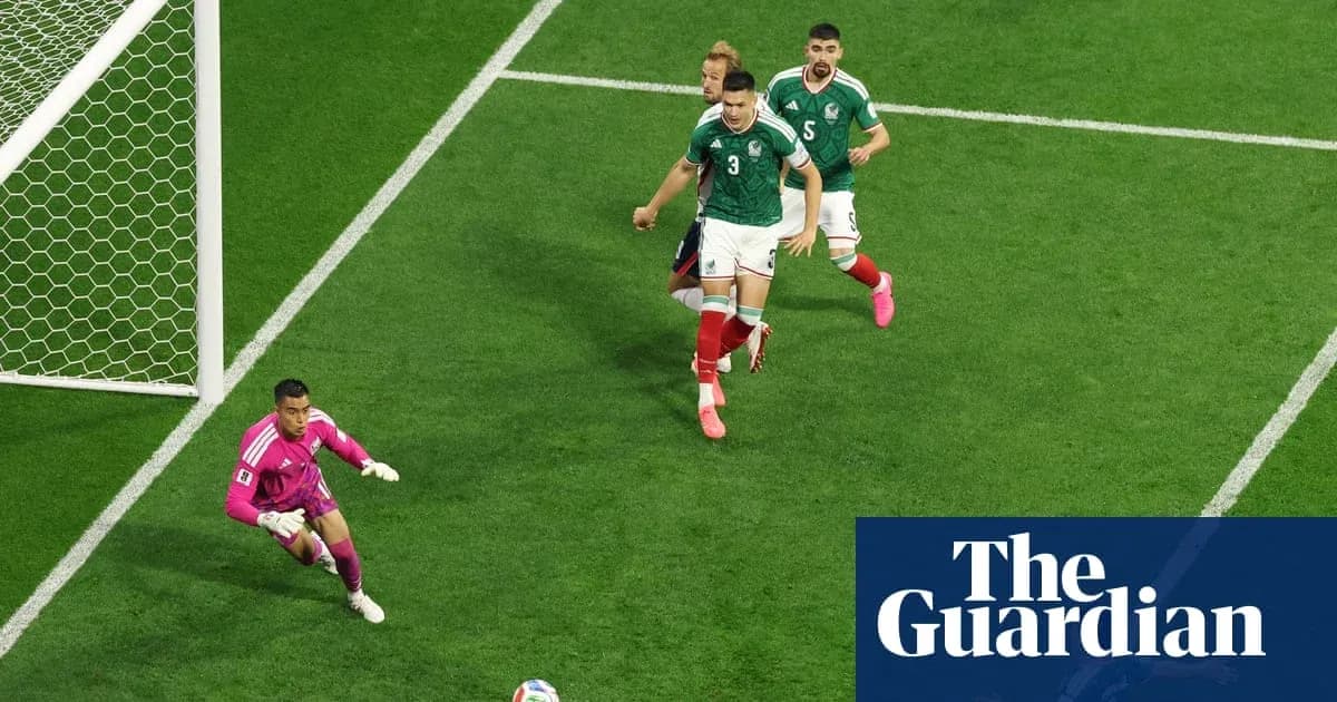 Mexican players defending near goal during match